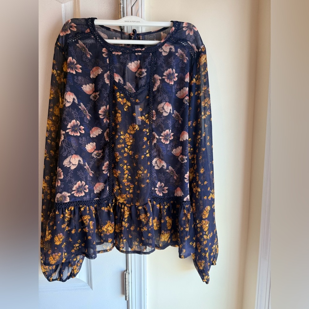Exhilaration semi-sheer elegant long sleeve floral blouse .